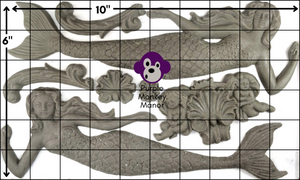 IOD Sea Sisters Mould with a six by ten inch grid laid over the mould to provide an approximate measurement of each element within the mould.