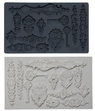 Load image into Gallery viewer, IOD Lock and Key Mould and a complete casting of the mould below it.
