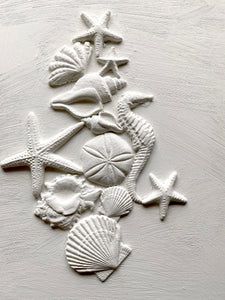 A composition created from the IOD Sea Shells mould.